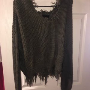 Small dark green sweater